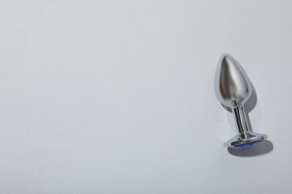 Plug anal metálico